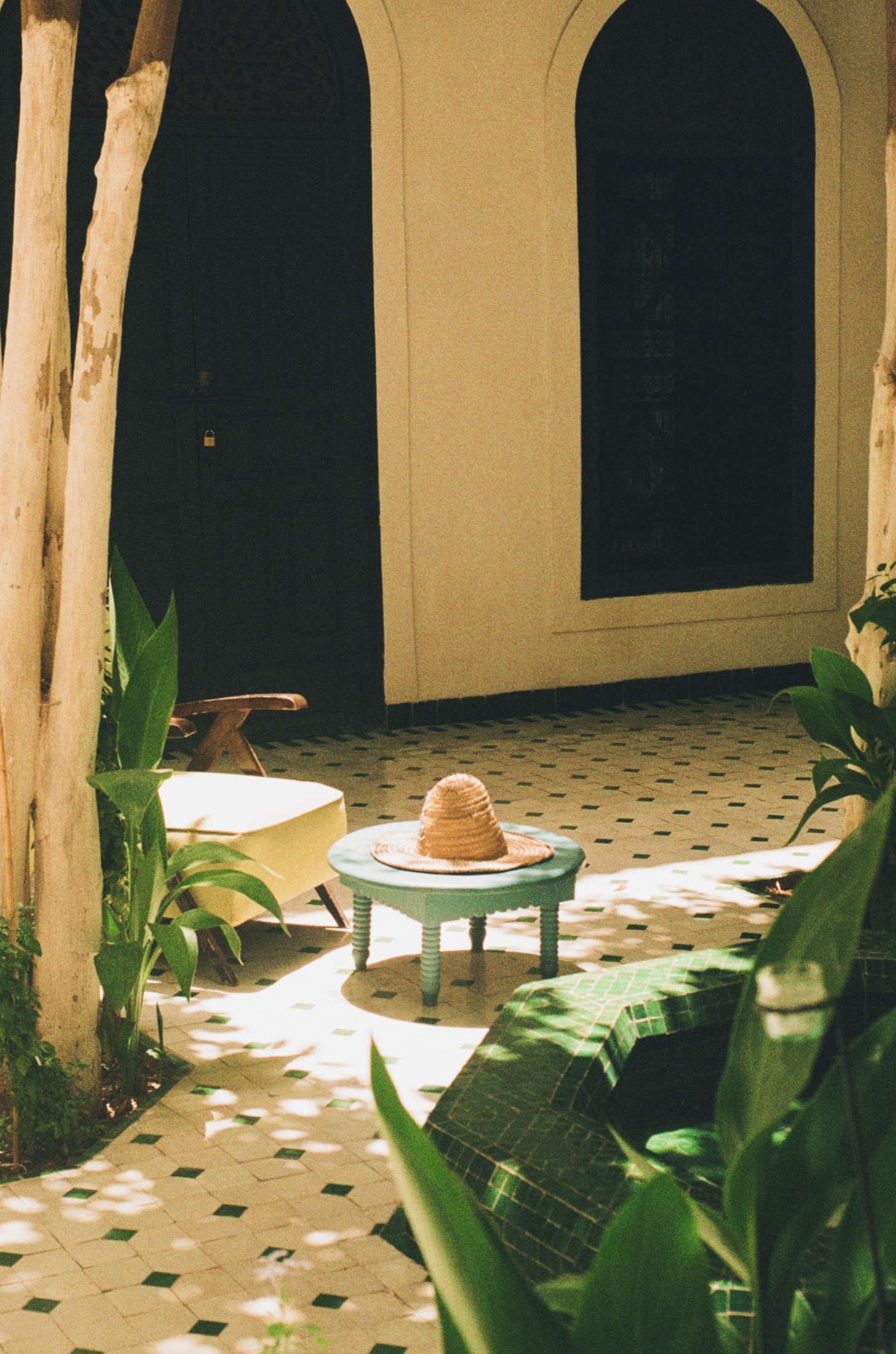 Straw hat, riad courtyard